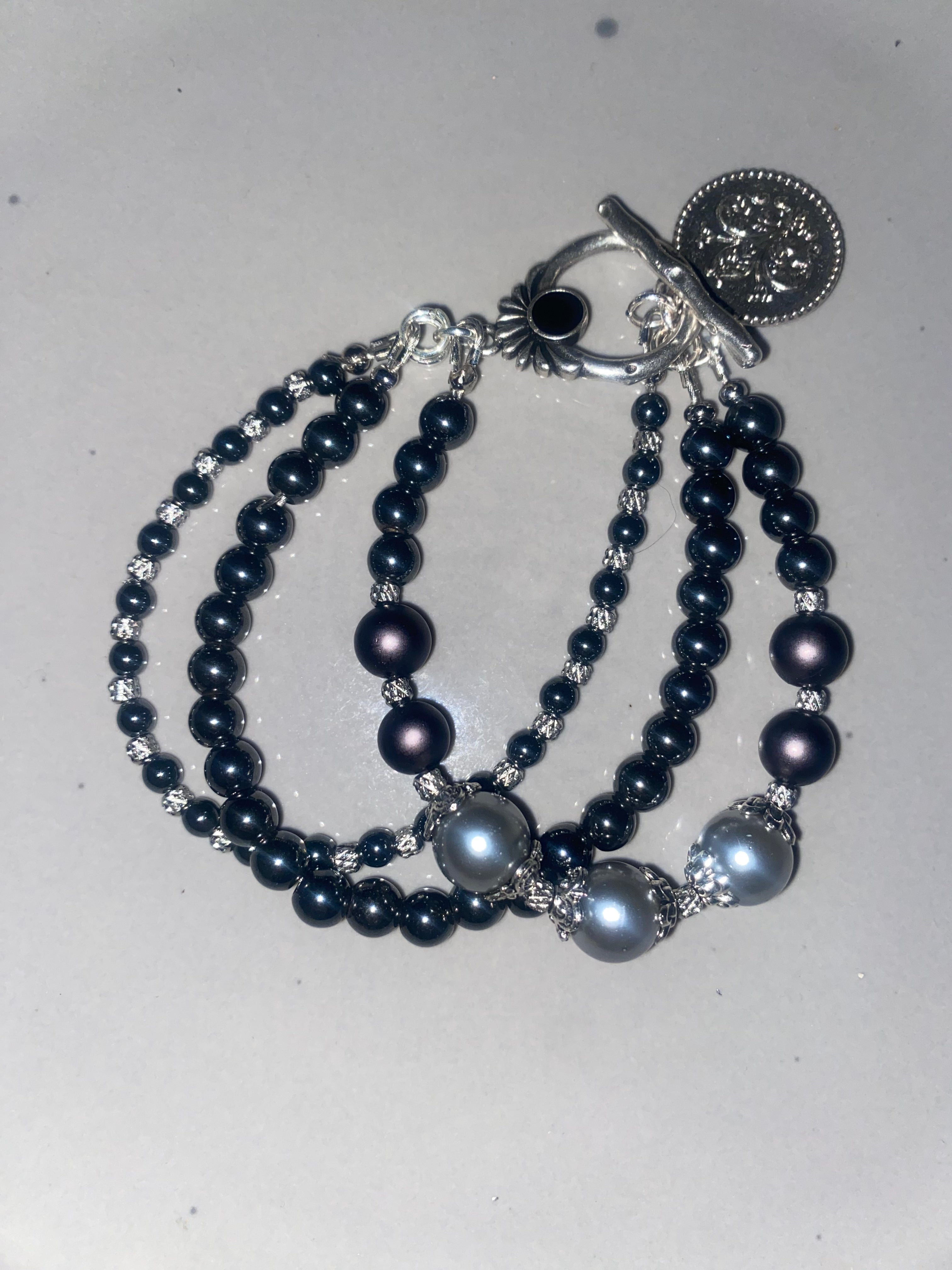 Guardian Angel 3 strand Bracelet Black and silver