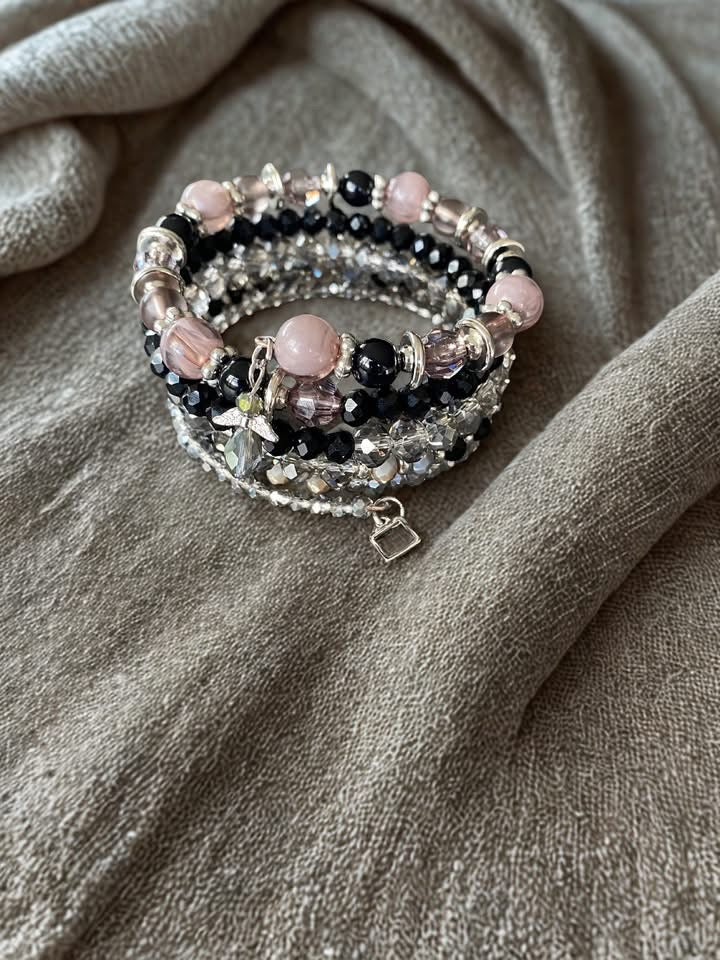 5 layer bracelet with black, crystal gray , soft pink, and a touch of silver
