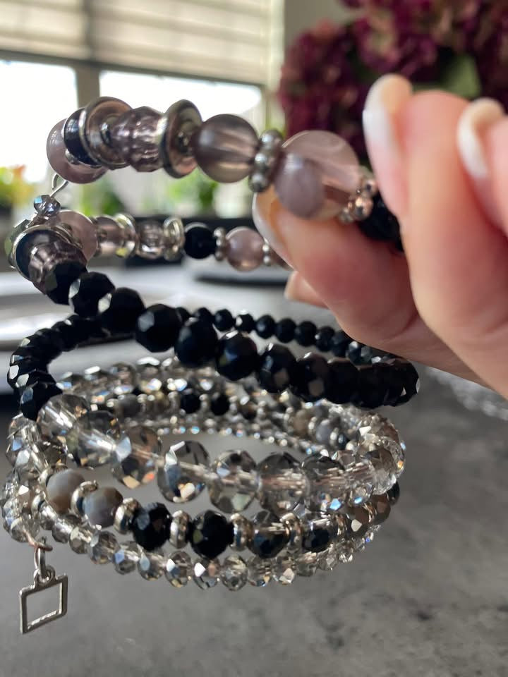 5 layer bracelet with black, crystal gray , soft pink, and a touch of silver